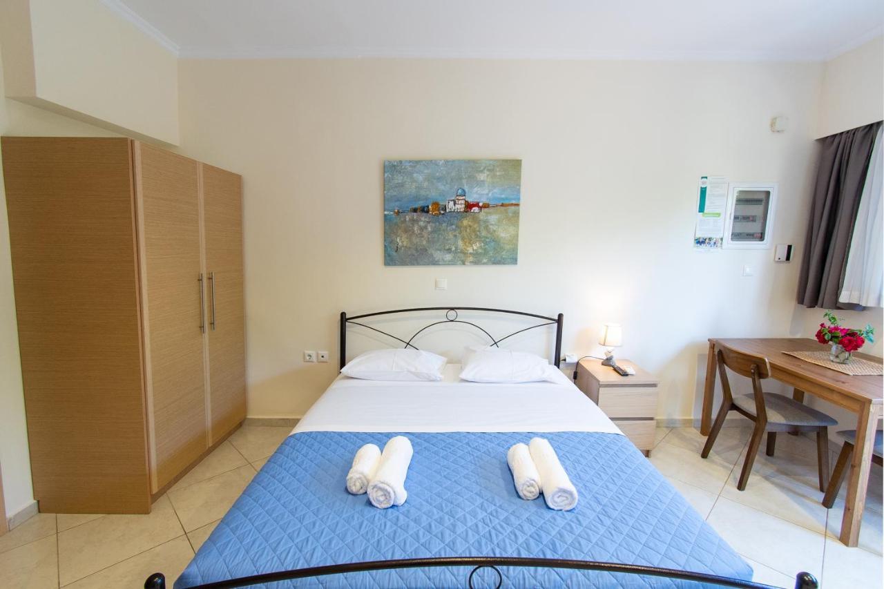 Fotis Apartments Артеміда Екстер'єр фото